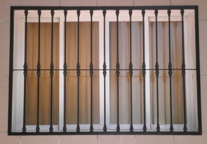 Doble ventana con enrejado